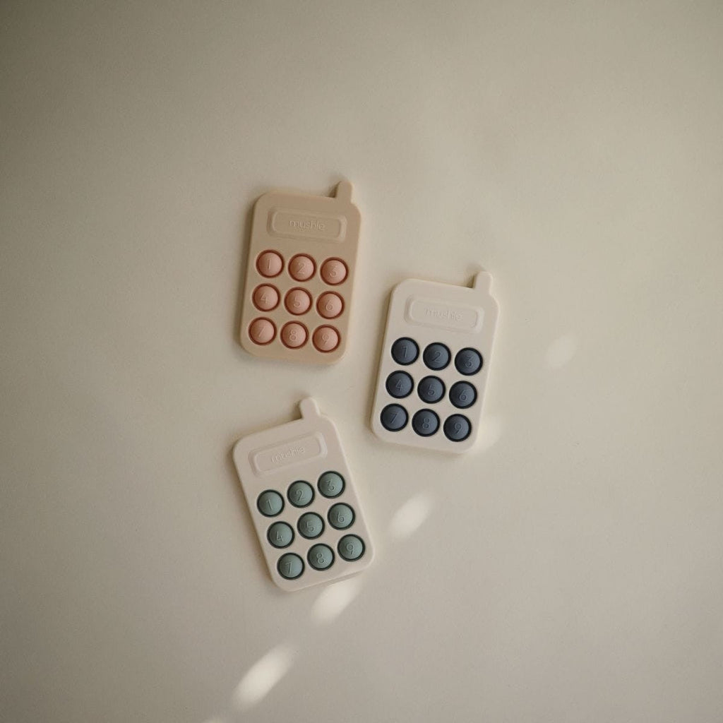 Pop it - Téléphone bleu Mushie